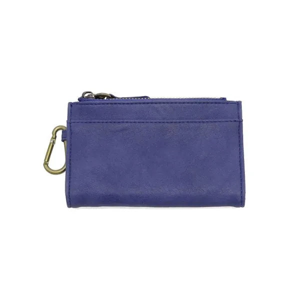 Purple leather bobbie bifold wallet with removable brass carabiner zipper and joy susan logo detail