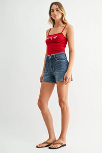 Red cropped tank with white horse embroidery on mid rise western pocket denim short