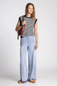 Red leather crossbody bag with structured slouchy design and visible stitching from supply orta boho chic collection