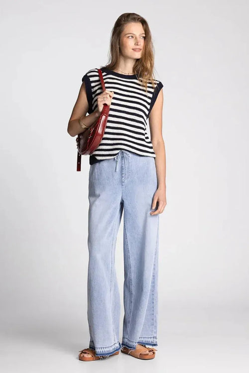 Red leather crossbody bag with structured slouchy design and visible stitching from supply orta boho chic collection