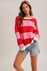 Crew neck relaxed oversized sweater in red pink stripes with cream trim