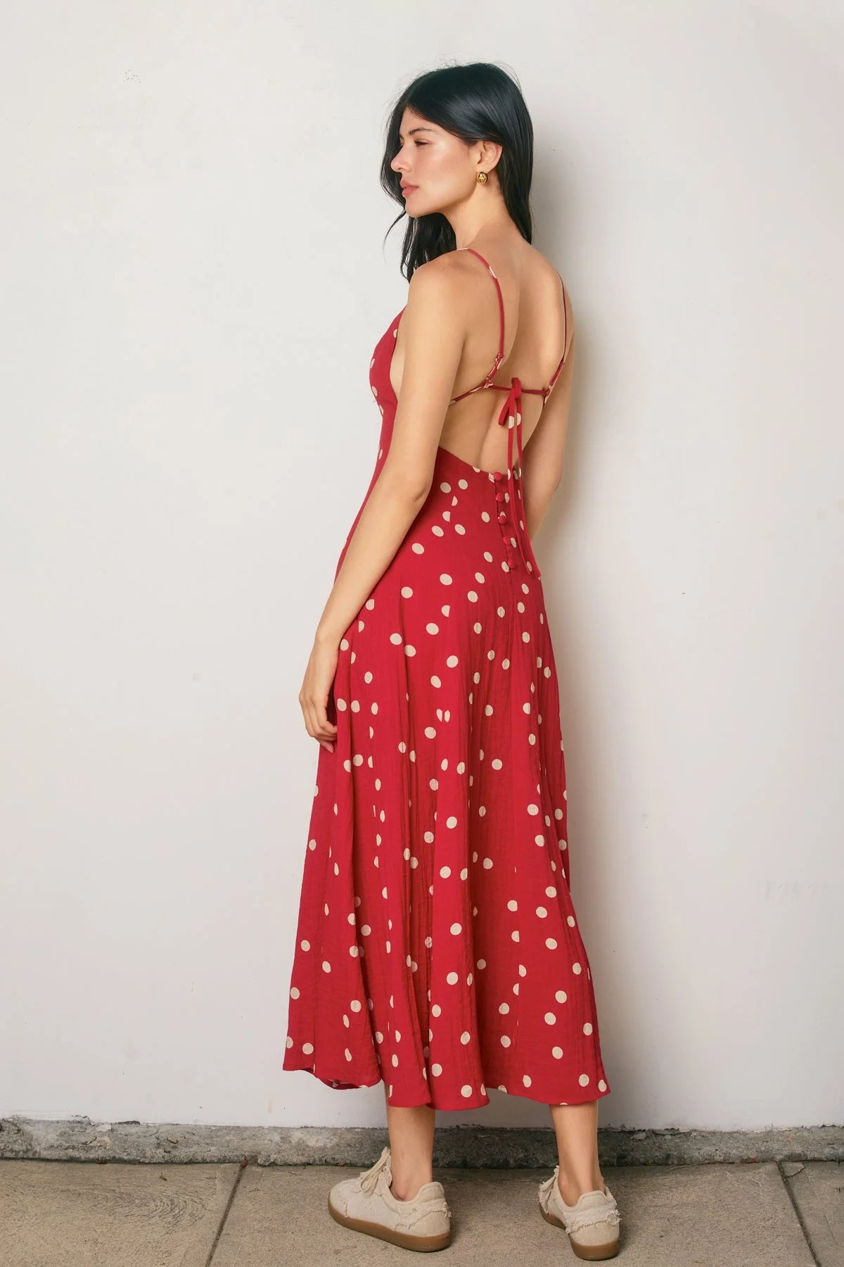 Red polka-dot maxi dress with thin straps and back tie detail, shop Daisy
