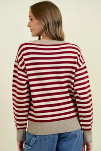 Round neck stripe color block sweater in red and white knit with beige ribbed cuffs hem and neckline