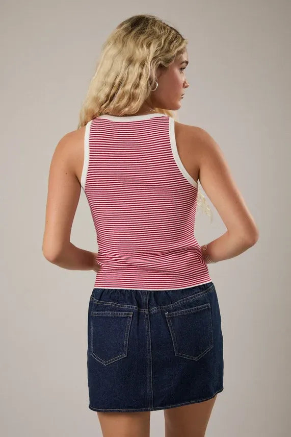 Red and white contrasted striped tank top with sleeveless design and white trim along neckline and armholes