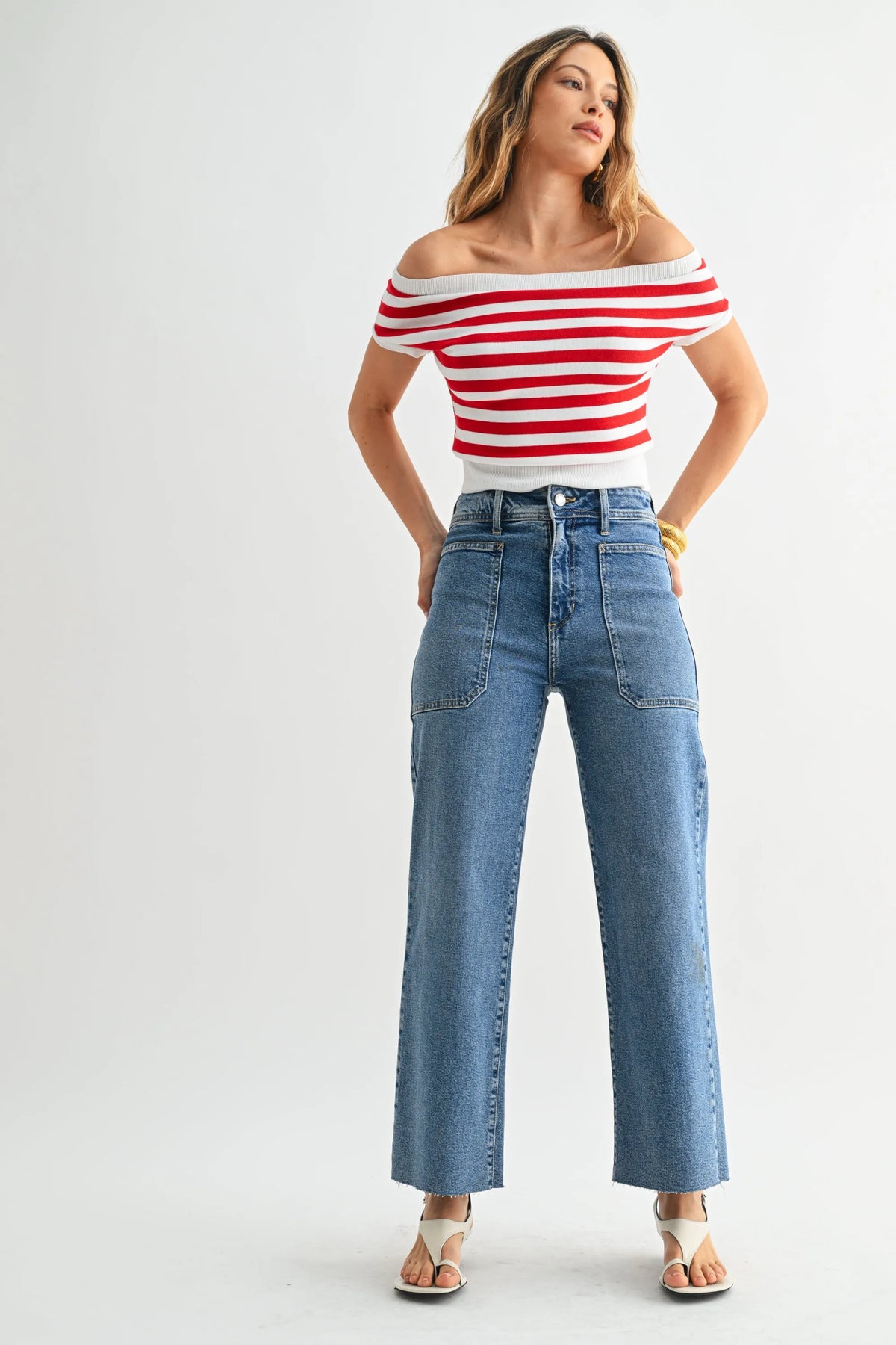 Red and white striped off-the-shoulder top paired with nautical wide leg denim high rise jeans