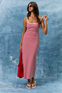 A red and white striped spaghetti strap binding stripe midi dress with lightweight fabric perfect for summer wear