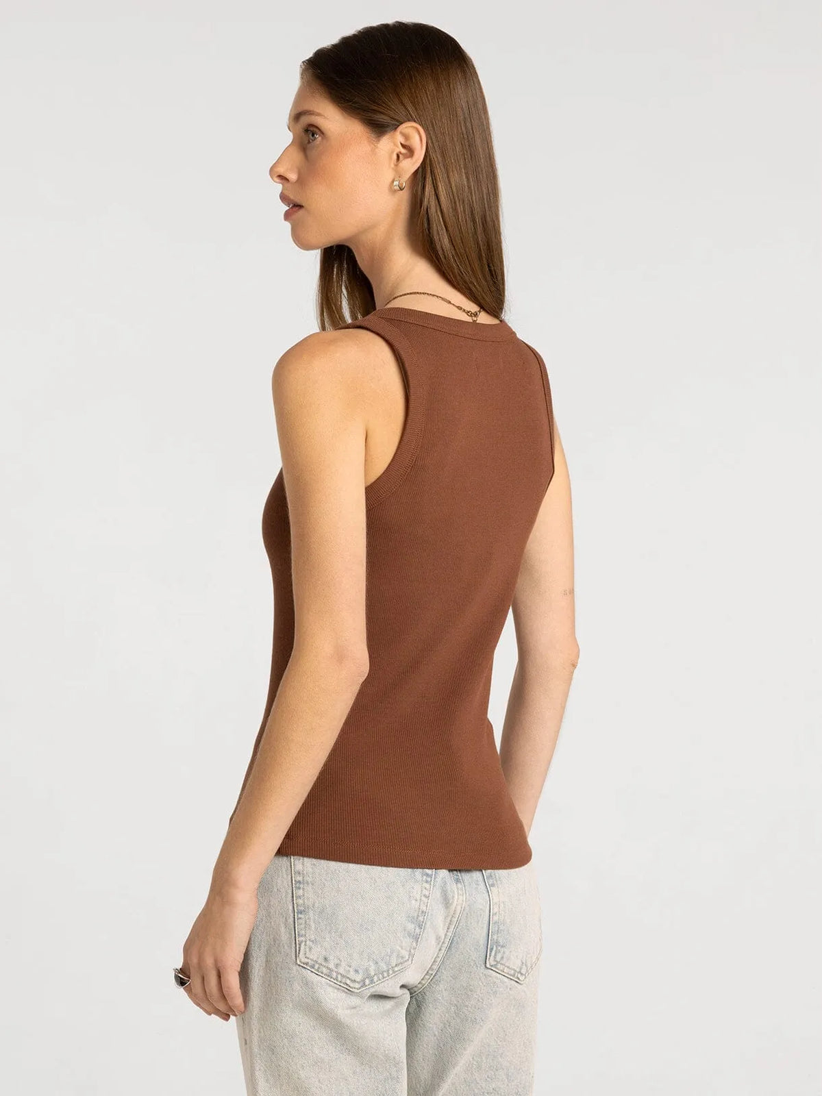 A ribbed sleeveless brown edlin basic tank with a rounded neckline and fitted silhouette by thread and supply