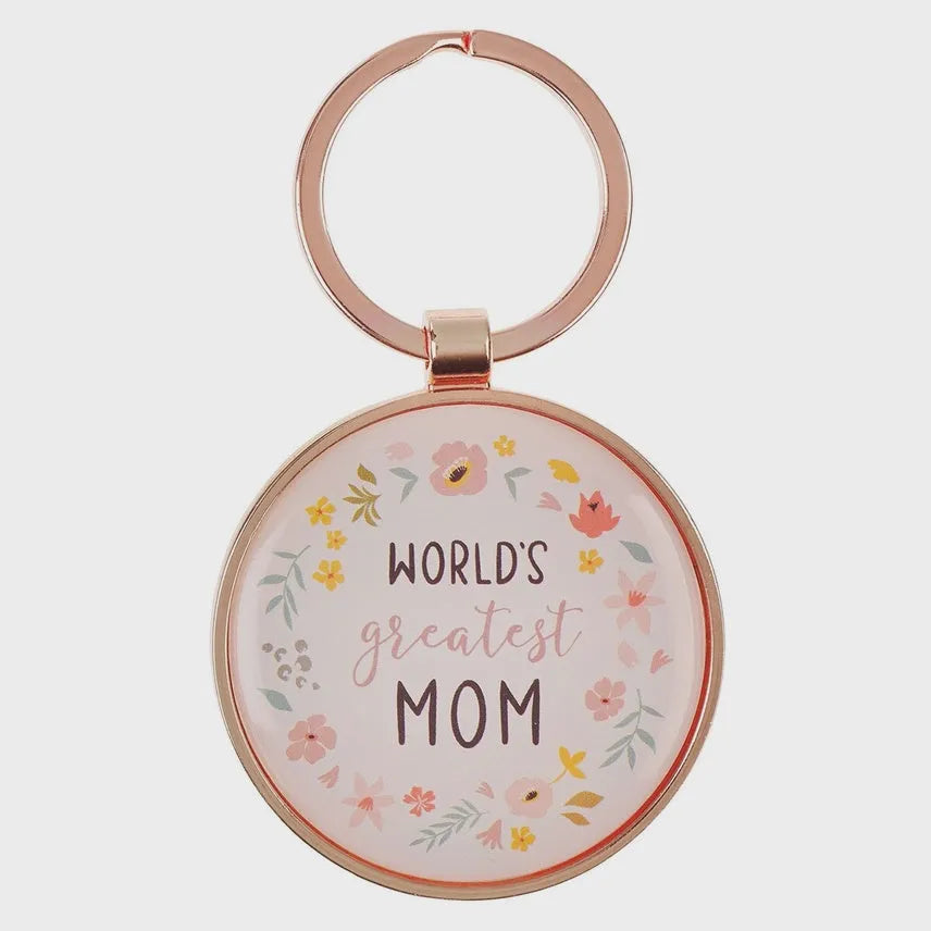 Rose gold keychain with circular glass charm featuring the text world’s greatest mom and floral illustrations