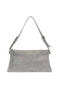 A sleek light gray eve trapeze vegan leather shoulder bag with minimalist design and adjustable strap