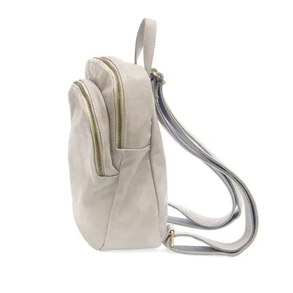 Frankie soft leather backpack in light gray vegan leather with gold logo zip pulls and secure zip closure