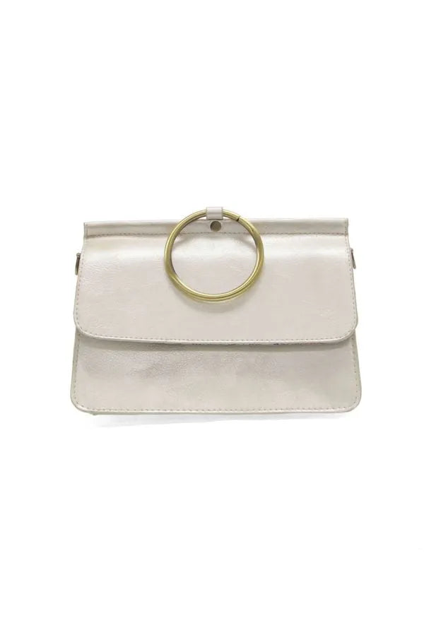 A sleek off-white leather aria ring bag with a gold-toned circular handle and interior zip compartments