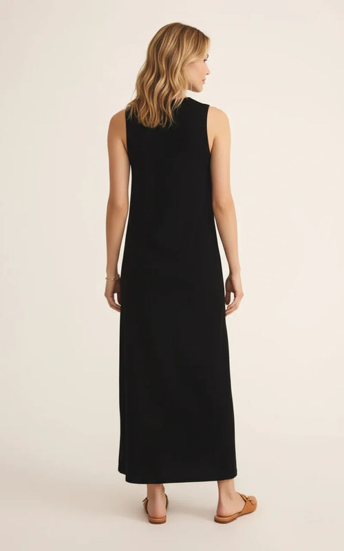 Sleek sleeveless black v-neck midi dress with high neckline and flowing fabric