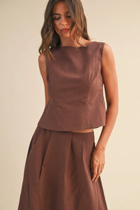 A sleek brown satin linen sleeveless peplum top with a structured bodice and elegant hem for stylish wear