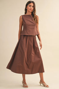 A sleek brown satin two-piece outfit with a pleated waist flare midi skirt and sleeveless peplum top