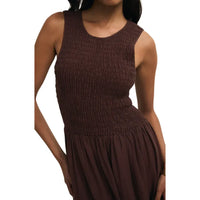 A sleeveless dark brown juniper smocked maxi dress with a smocked bodice and gathered waistline