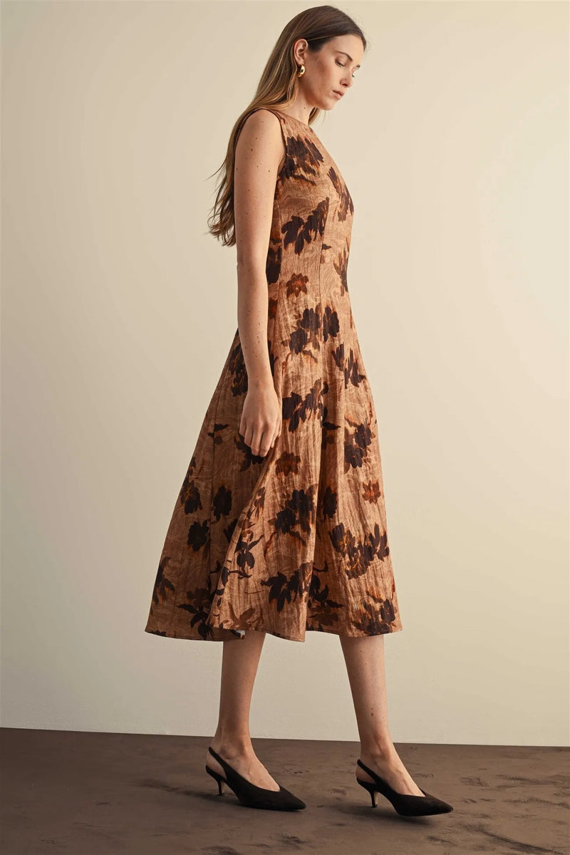 Flower print sleeveless midi dress in warm beige fabric with dark brown leaf patterns perfect for elegant occasions