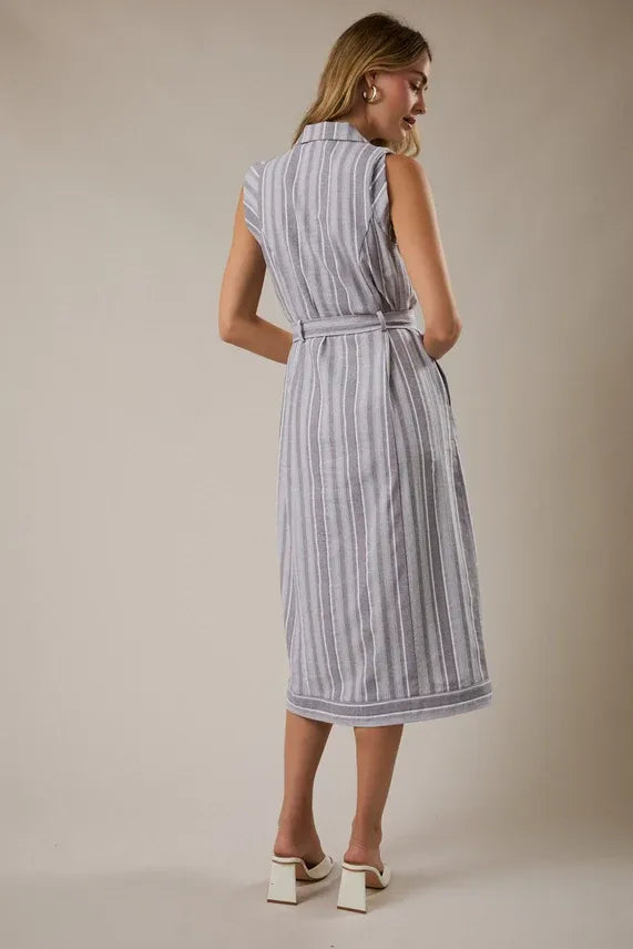 A sleeveless knee-length gray and white striped dress with a waist tie belt and matching tie belt detail