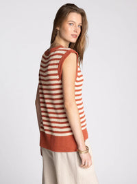 A sleeveless knitted vest in rust and cream stripes with ribbed hem from supply orta women’s boho chic clothing shop daisy
