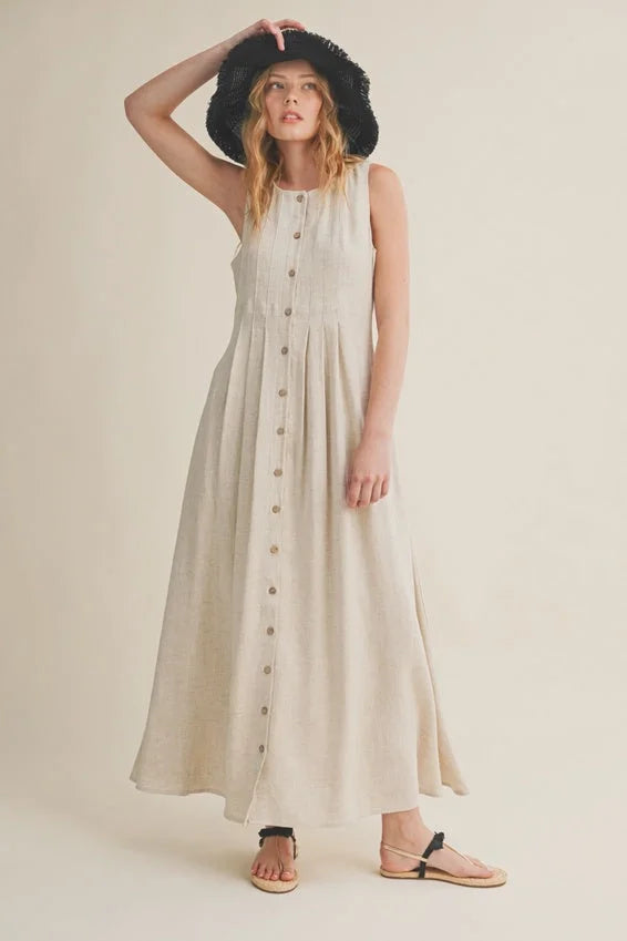 Flowing off-white linen maxi dress with button front and pleated skirt