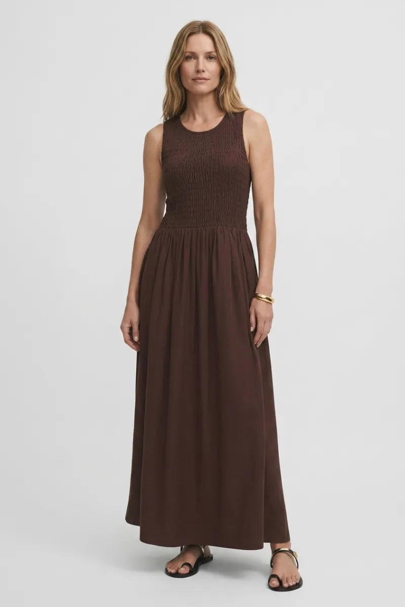 A sleeveless ribbed brown juniper smocked maxi dress with a fitted bodice and flowing skirt