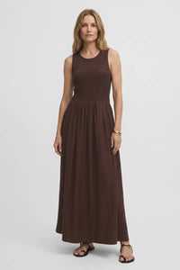 A sleeveless ribbed brown juniper smocked maxi dress with a fitted bodice and flowing skirt