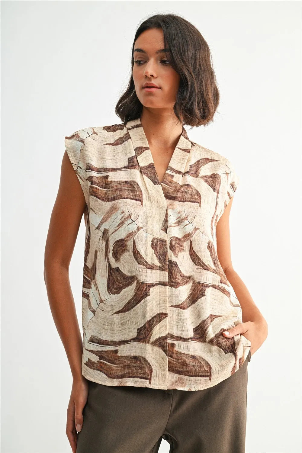 Geo print v neck sleeveless blouse in brown and beige brushstroke pattern made from lightweight fabric