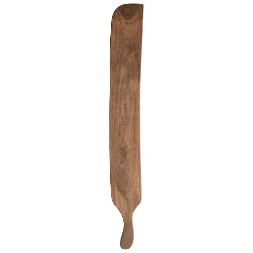 A smooth brown acacia wood rolling pin with natural grain finish paired with acacia wood cutting board with handle