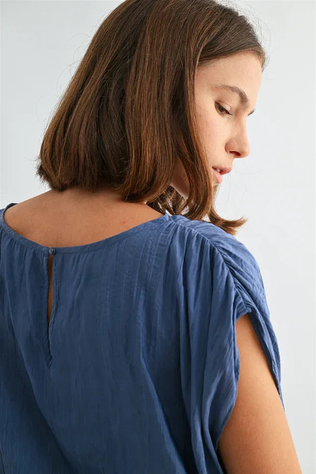 Back view of Crinkle Satin Elastic Hem Top in soft blue with gathered shoulders