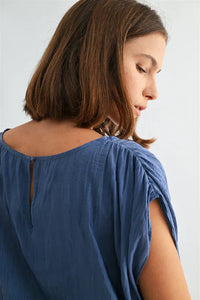 Back view of Crinkle Satin Elastic Hem Top in soft blue with gathered shoulders