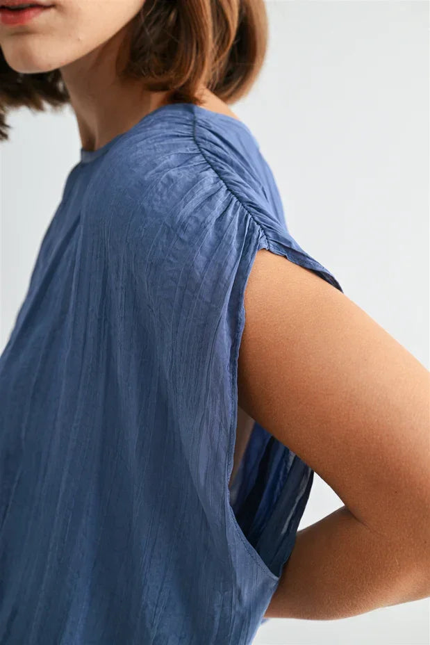 Crinkle satin elastic hem top with soft blue sleeveless gathered shoulders