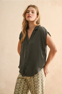 A soft dark olive green lightweight button cap sleeve shirt with a relaxed fit and subtle sheen