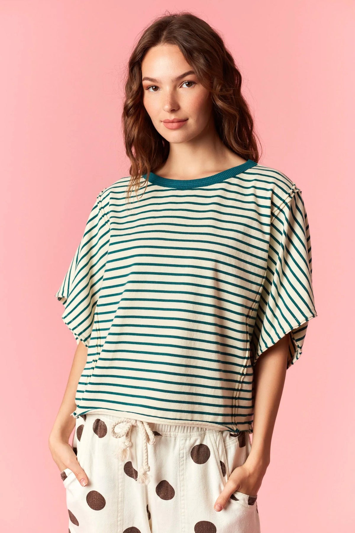 A soft loose-fitting yarn dyed stripe round neck tee with horizontal teal and off-white stripes