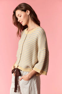 A soft knitted oversized cardigan in pale yellow and light gray stripes with stripe curly edge ribbed hem and cuffs