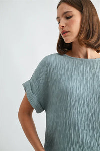 Texture dolman sleeve woven top in soft light blue pleated cotton