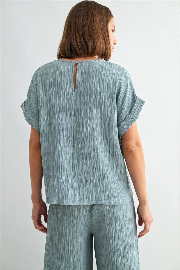 Texture dolman sleeve woven top in soft light blue ribbed texture