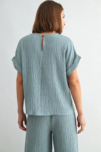 Texture dolman sleeve woven top in soft light blue ribbed texture