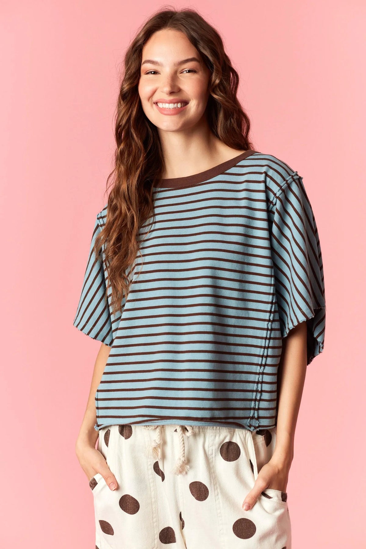 A soft light blue and dark brown yarn dyed stripe round neck tee with a relaxed fit and short sleeves