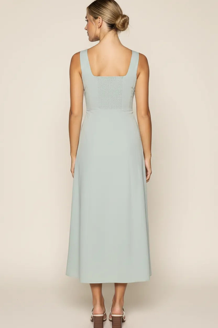 Soft mint green sleeveless midi dress with square neckline and fitted waist in lost + wander vista marina maxi dress style