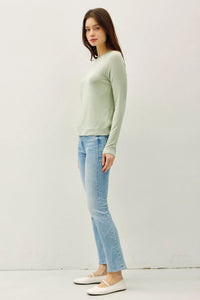 A soft mint green modal raglan sleeve layering basic top with long sleeves and a simple round neckline in stretchy fabric