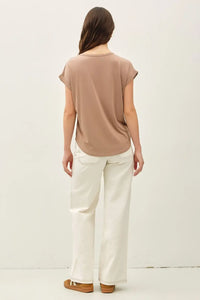 A soft muted beige bamboo round neck cap sleeve top with relaxed fit and rounded neckline for casual wear