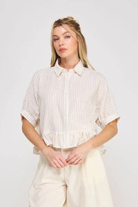 A soft off-white button down striped ruffle top with delicate vertical stripes and ruffled cuffs for women’s boho chic clothing