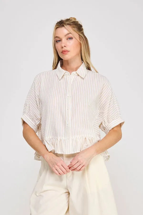 A soft off-white button down striped ruffle top with delicate vertical stripes and ruffled cuffs for women’s boho chic clothing
