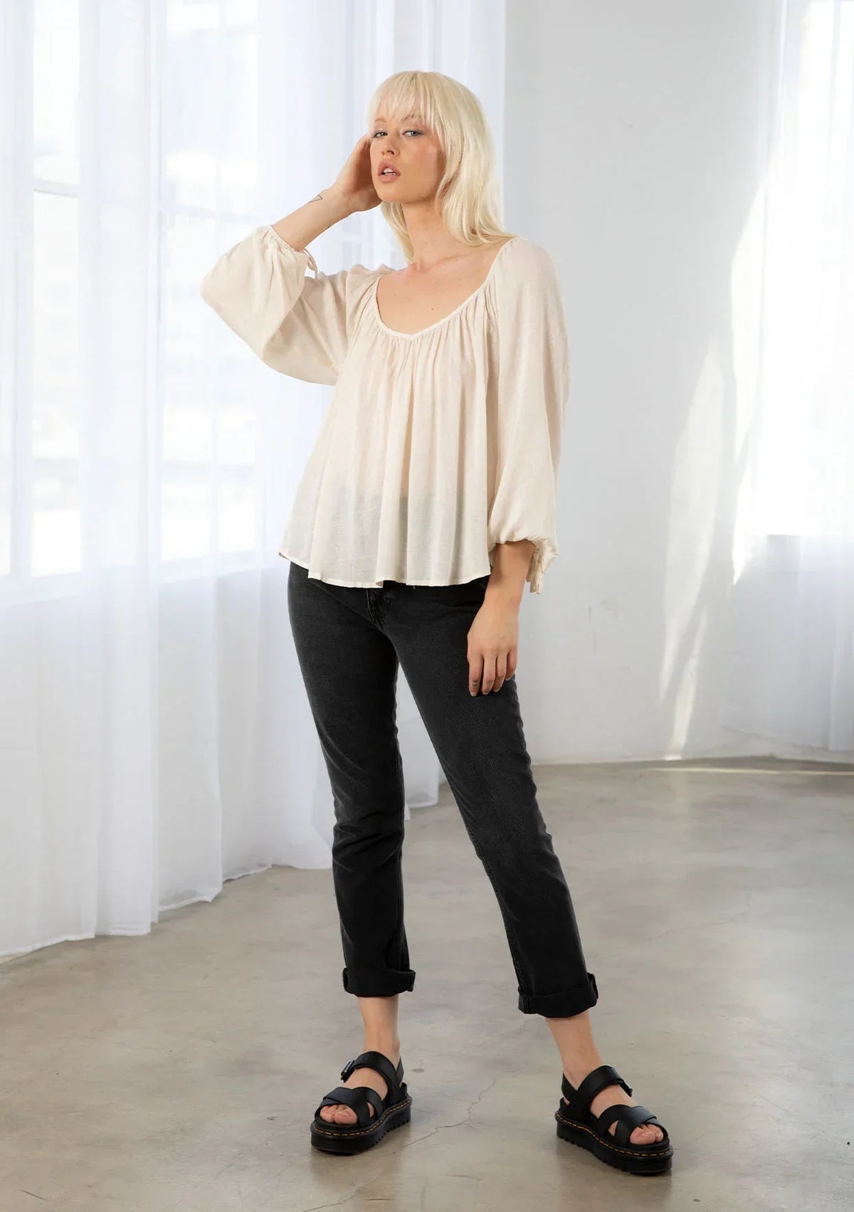 Bohemian long sleeve V neck floral top in soft off-white with loose fit and gathered neckline