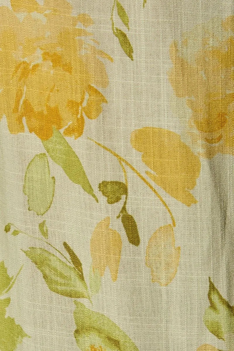 Midi rise elastic wide pants in off-white linen with elastic waist band and delicate yellow green floral pattern