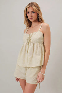 Off-white ribbed fabric ties stripe short top with delicate spaghetti straps and gathered waist with matching drawstrings