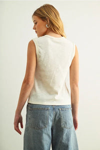 Soft off-white sleeveless cotton round neck top with relaxed fit