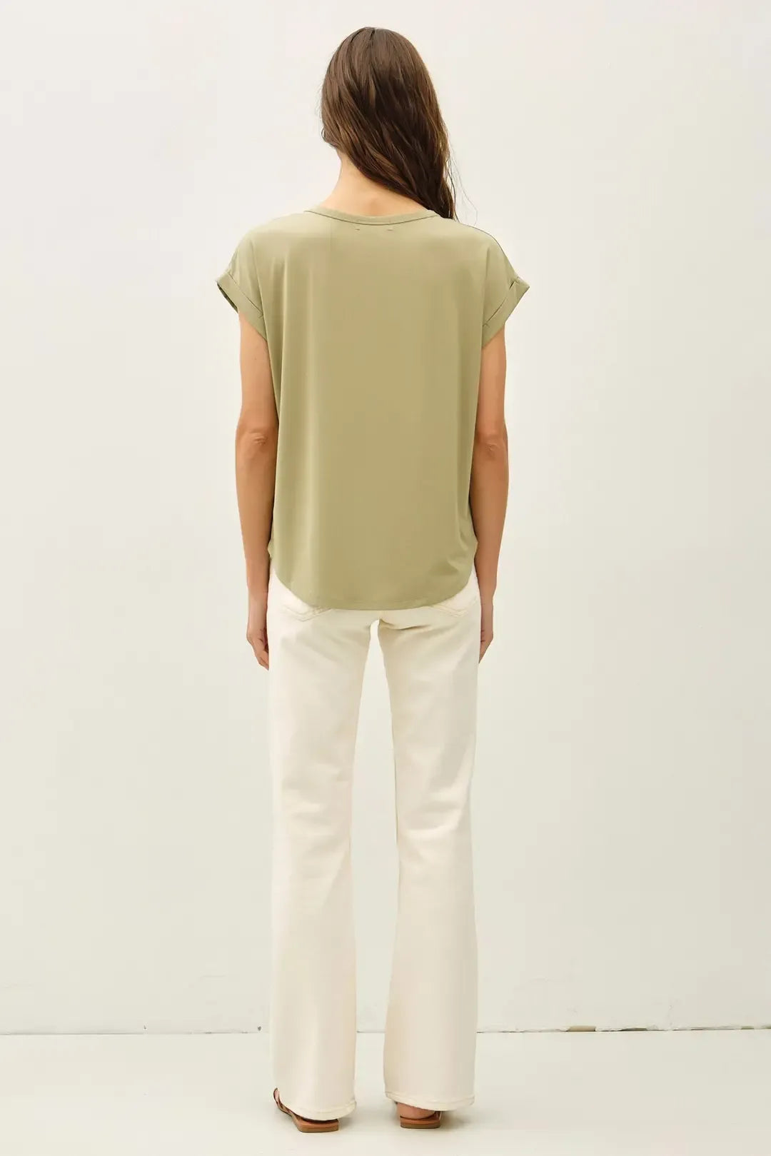 A soft olive green bamboo round neck cap sleeve top with lightweight fabric and relaxed fit