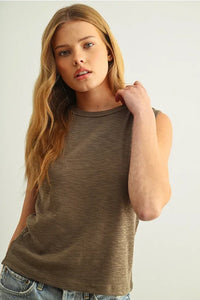 Sleeveless cotton round neck top in soft olive green with relaxed fit