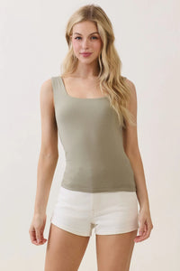 A soft sage green double layer square neck basic tank top with a sleeveless relaxed fit and breathable fabric