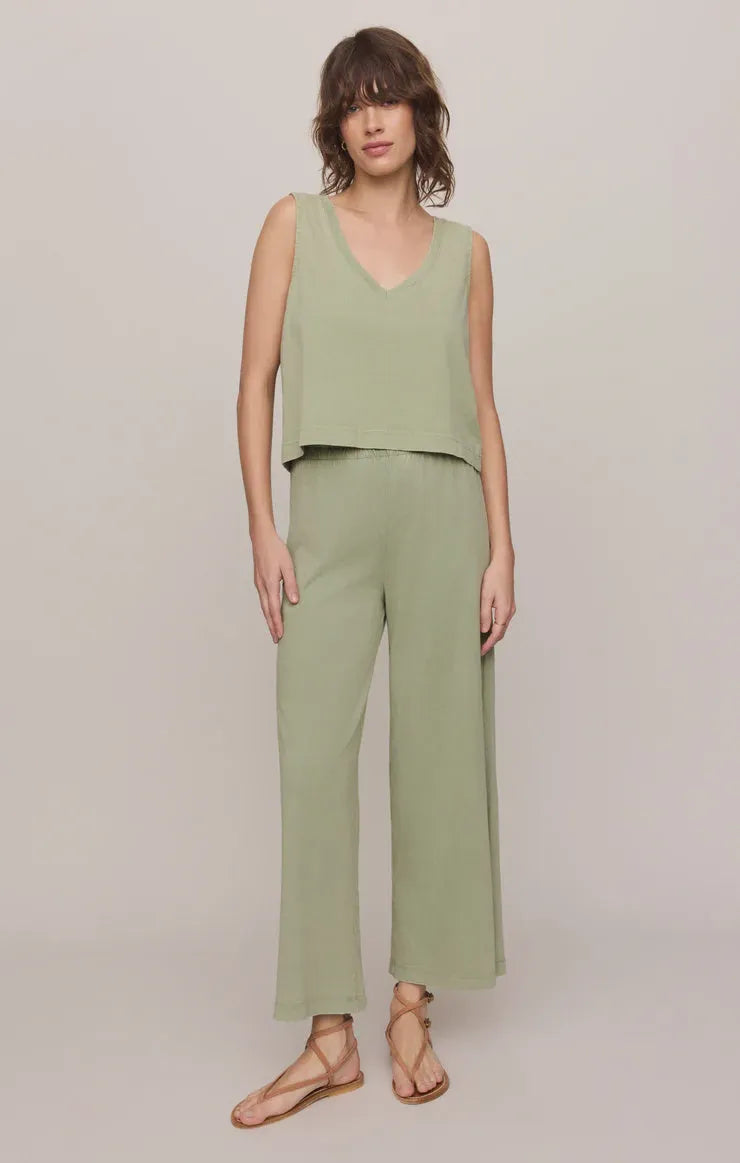 Soft sage green scout jersey sleeveless top with v-neckline paired with matching jersey cropped pants wide-leg design